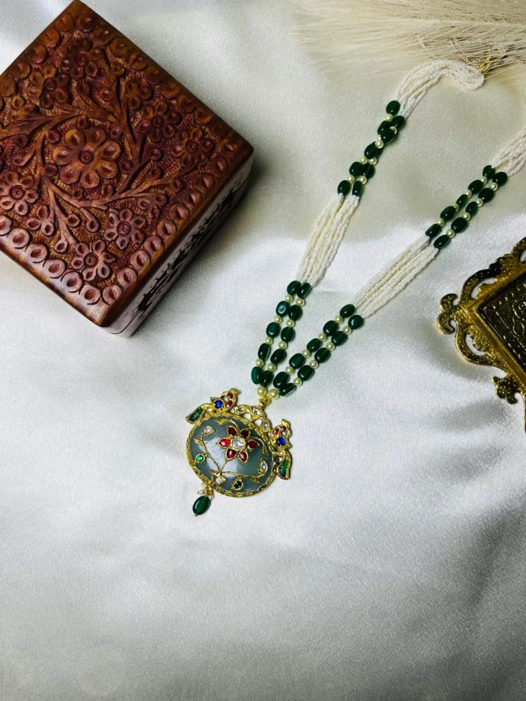 Antique stone jewellery highlighted with intricate 22K gold detailing