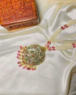 Antique stone jewellery highlighted with intricate 22K gold detailing