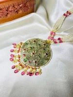 Antique stone jewellery with intricate Hauldal work and 22K gold