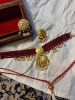 22K gold ornament featuring delicate natural diamond polkis