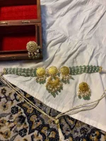 Lightweight 22K gold necklace adorned with natural diamond polkis