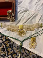 Fine 22K gold necklace set with naturally sourced diamond polkis