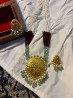 Elegant 22K lightweight gold ornament with diamond polki detailing