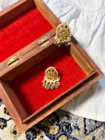 Elegant 22K lightweight gold earrings with diamond polki detailing