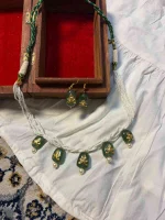 22K gold jewellery showcasing antique stone neckpiece and Hauldali craftsmanship