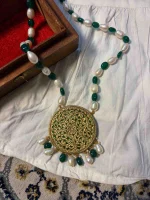 22K gold jewellery with antique stone and delicate Jadai detailing