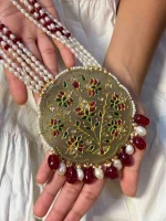 22K gold pendant crafted with antique stone and Jadai work