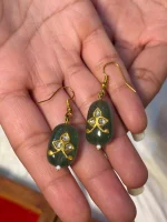 22K gold ornament showcasing antique stone and Hauldali craftsmanship