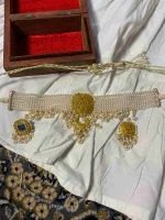 Lightweight gold ornament with natural diamond polki craftsmanship