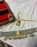 Natural diamond polki embellishments on finely crafted 22K gold ornament